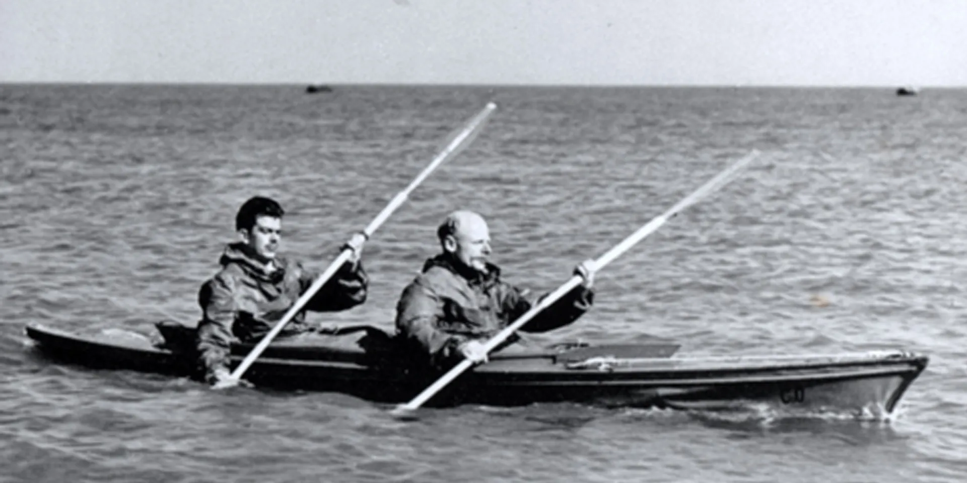 Major Herbert 'Blondie' Hasler and a colleague paddling a canoe, c1942